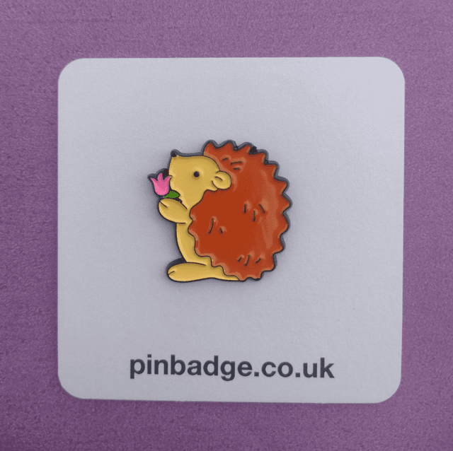 Hedgehog holding a flower